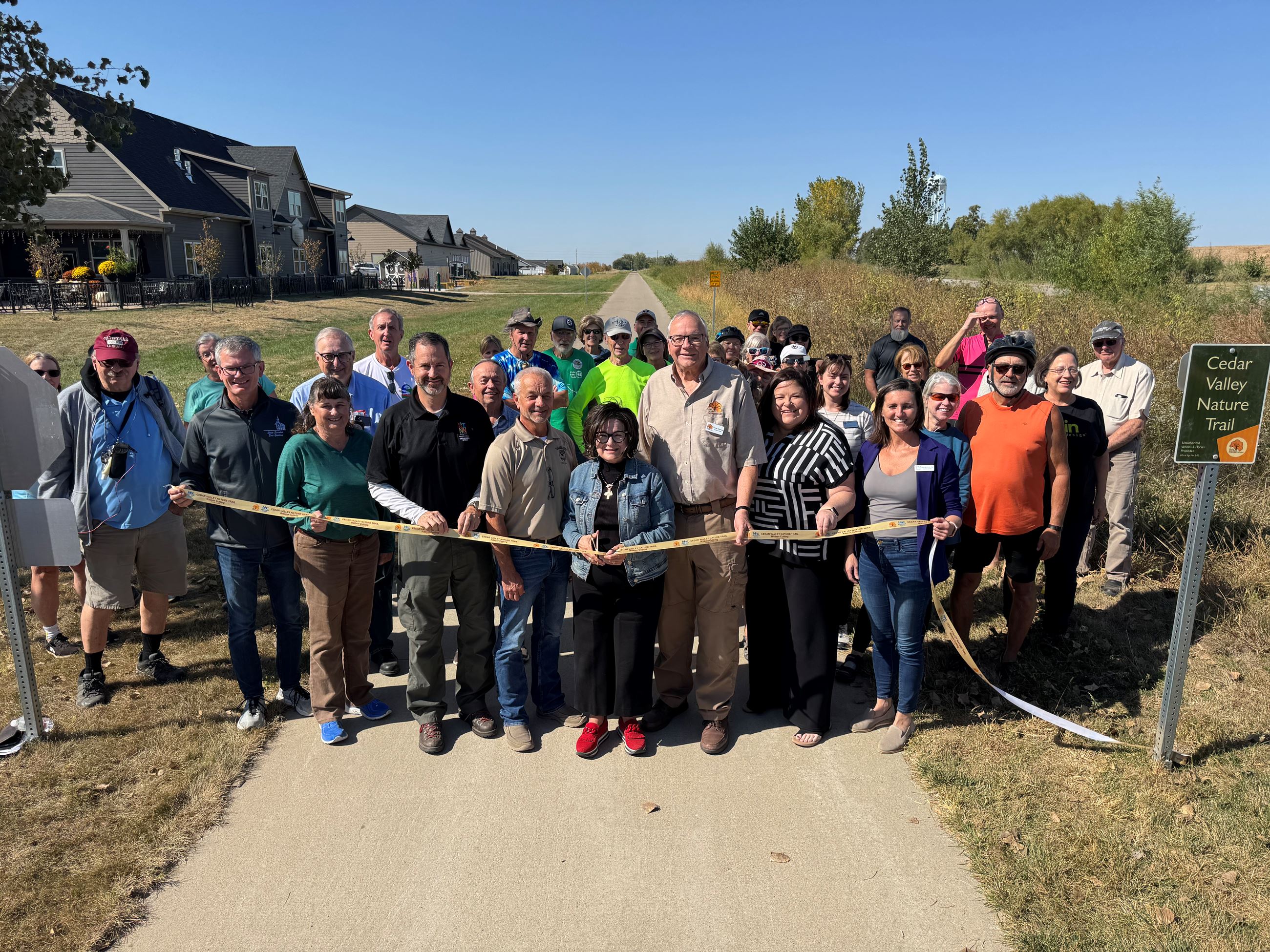 Image of people at ribbon cutting