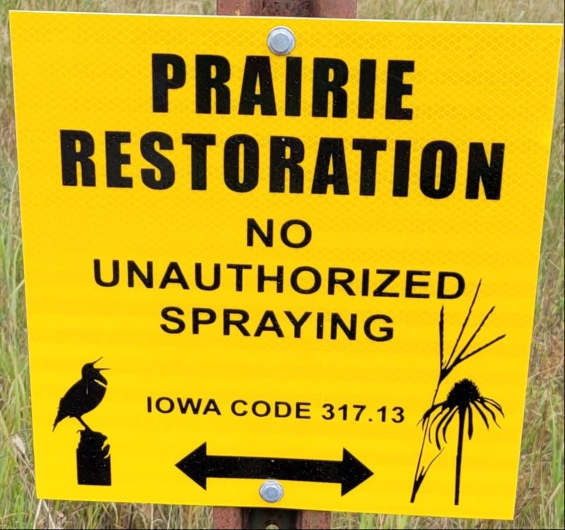 Yellow sign - Prairie Restoration