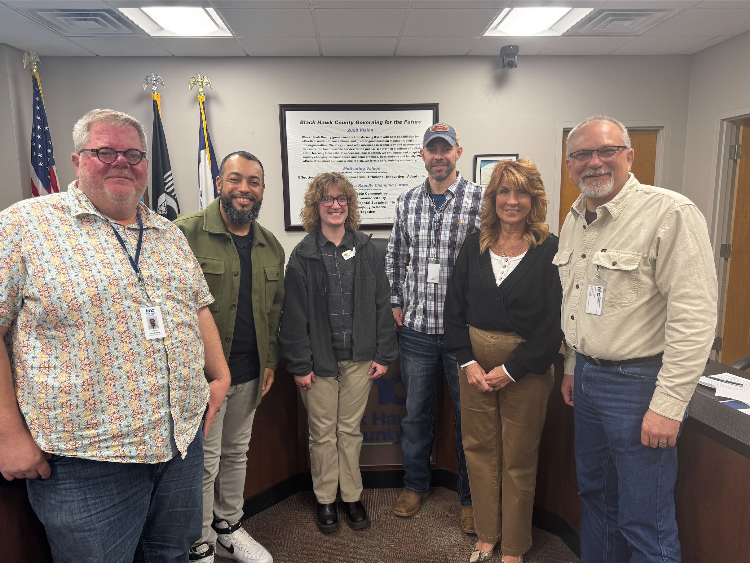 Board of Supervisors pose with a representative from Riverview Center.