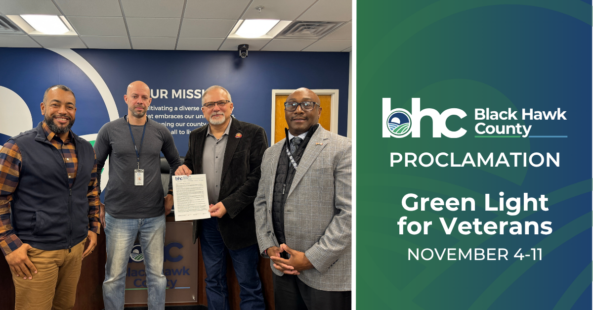 Director Yolando Loveless pictured with 3 members of the Board of Supervisors.